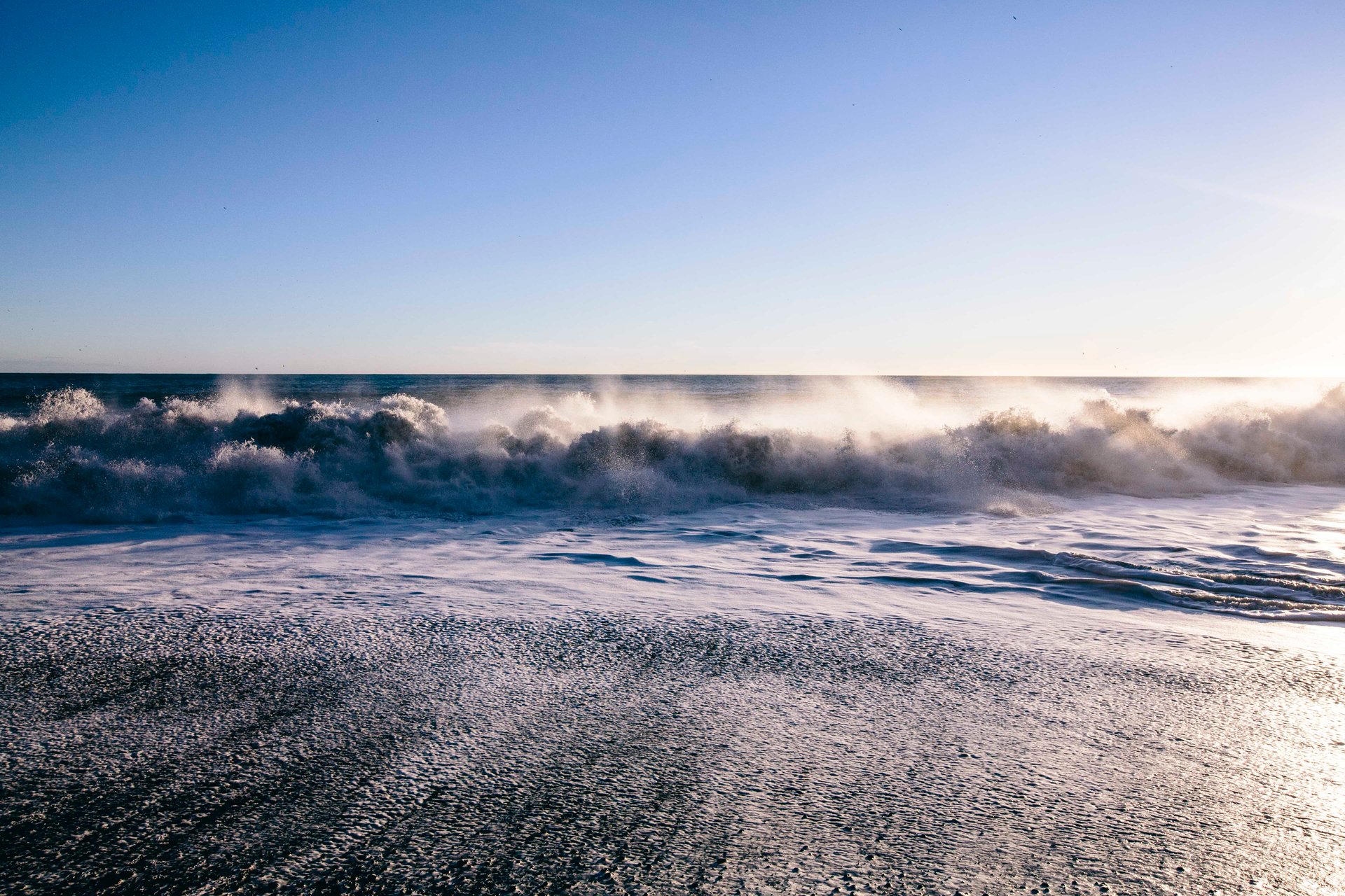 Icelandic landscape, plain and mountains beneath overcast sky